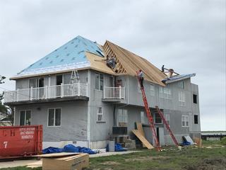 We started by installing Deck Armor underlayment to protect the home from any potential future leaks. This roof also featured snow guards for more efficient snow and ice management.