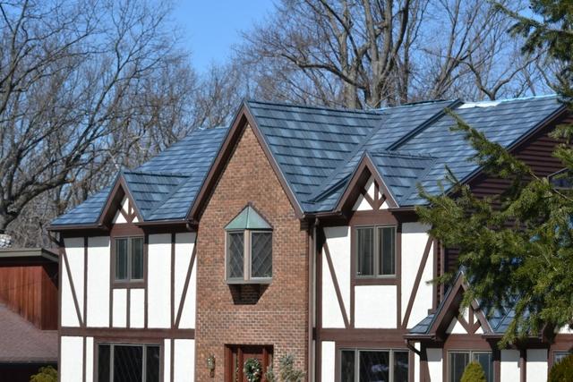  Tudor Style Home with Metal Roof