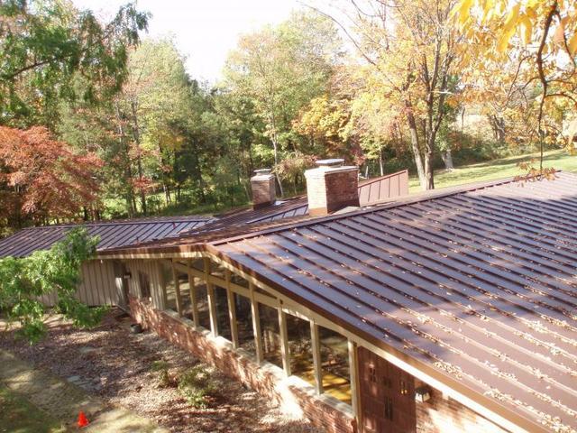 Battling Low Slope Roofs with Mechanically Seamed Metal Roofing