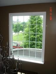 The interior of this home was improved with the addition of this large energy efficient window!