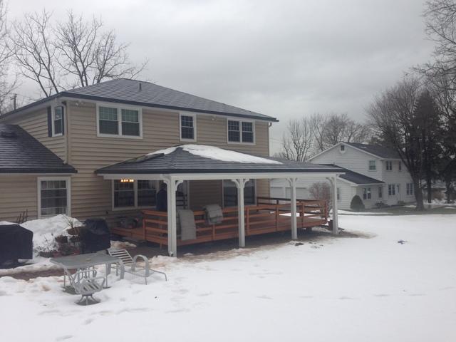Vermont Blue Metal Slate Roof, Tuscan Clay Beaded Insulated Vinyl Siding, Custom Marvin Infinity Double Hung Fiberglass Windows, and Rear Porch Portico Installation in Lafayette Hill, PA
