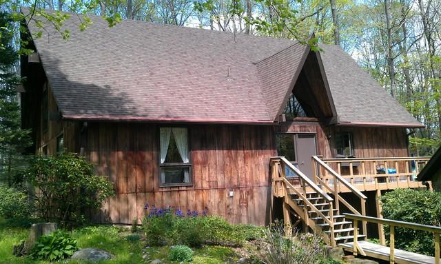 Replacing Damaged Asphalt Shingles with Heather Bl end Metal Shingles in Perkasie, PA