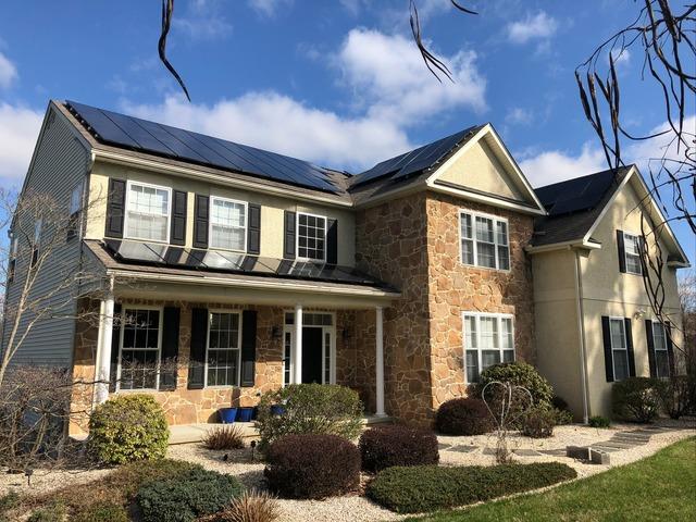 Removing Asphalt Shingles and Solar Panels and Installing Terra Cotta Standing Seam Metal Roof in Downingtown, PA