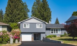 exterior of family home with new siding and windows