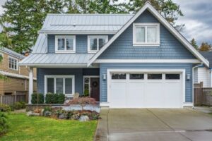 exterior of home with new siding and metal roof